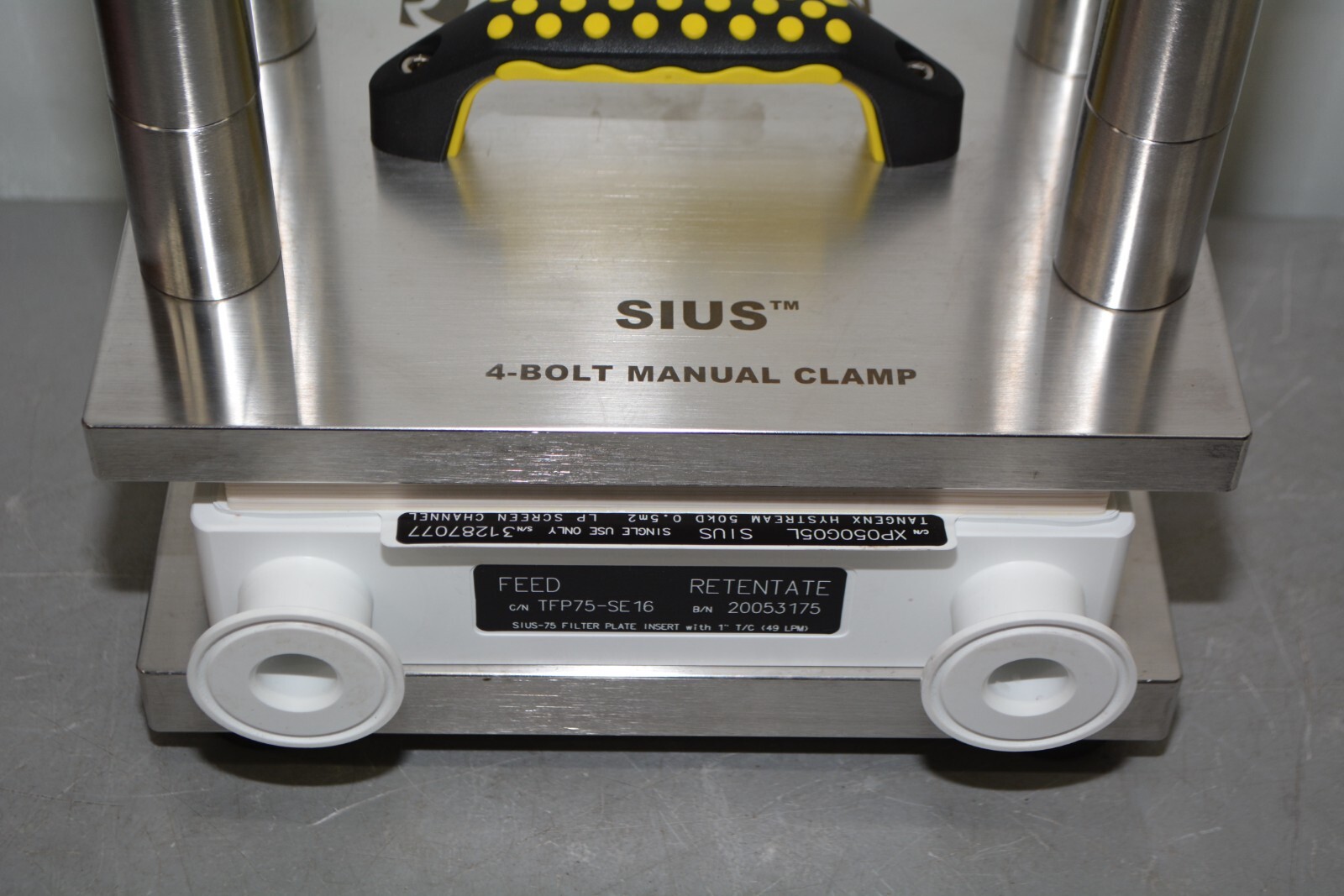 ^ Repligen TSPDI-4BMC SIUS 4-Bolt Manual Cassette Clamp W/ SIUS Filter Plate
