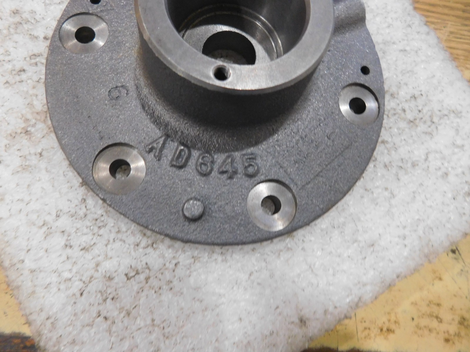 Model AD645 Pump End Plate. Unknown Manufacturer. 5″ O.D. Unused Spares