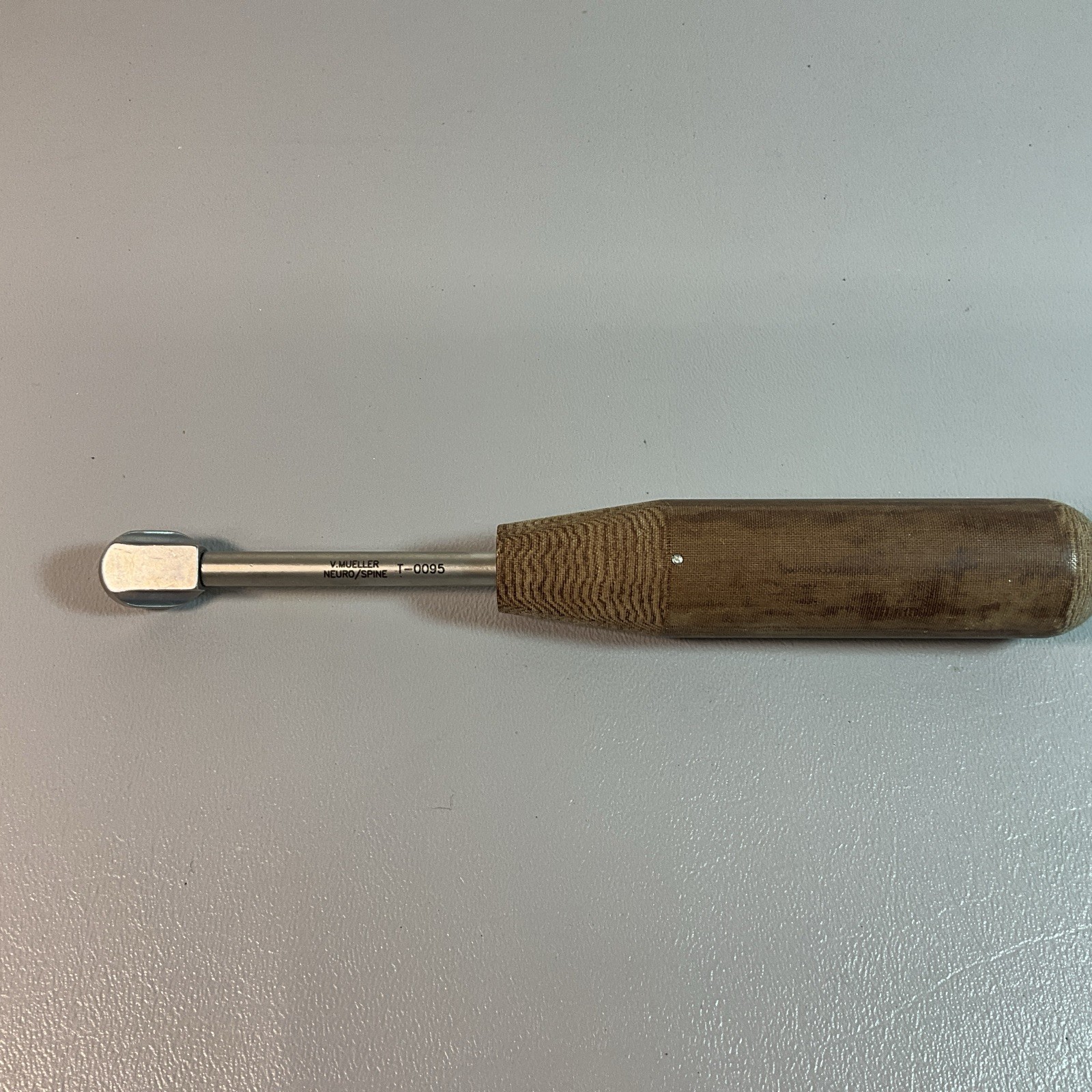 V. MUELLER #T0095, SHADOW LINE LOCKING TOOL WOODEN HANDLE. (C218).